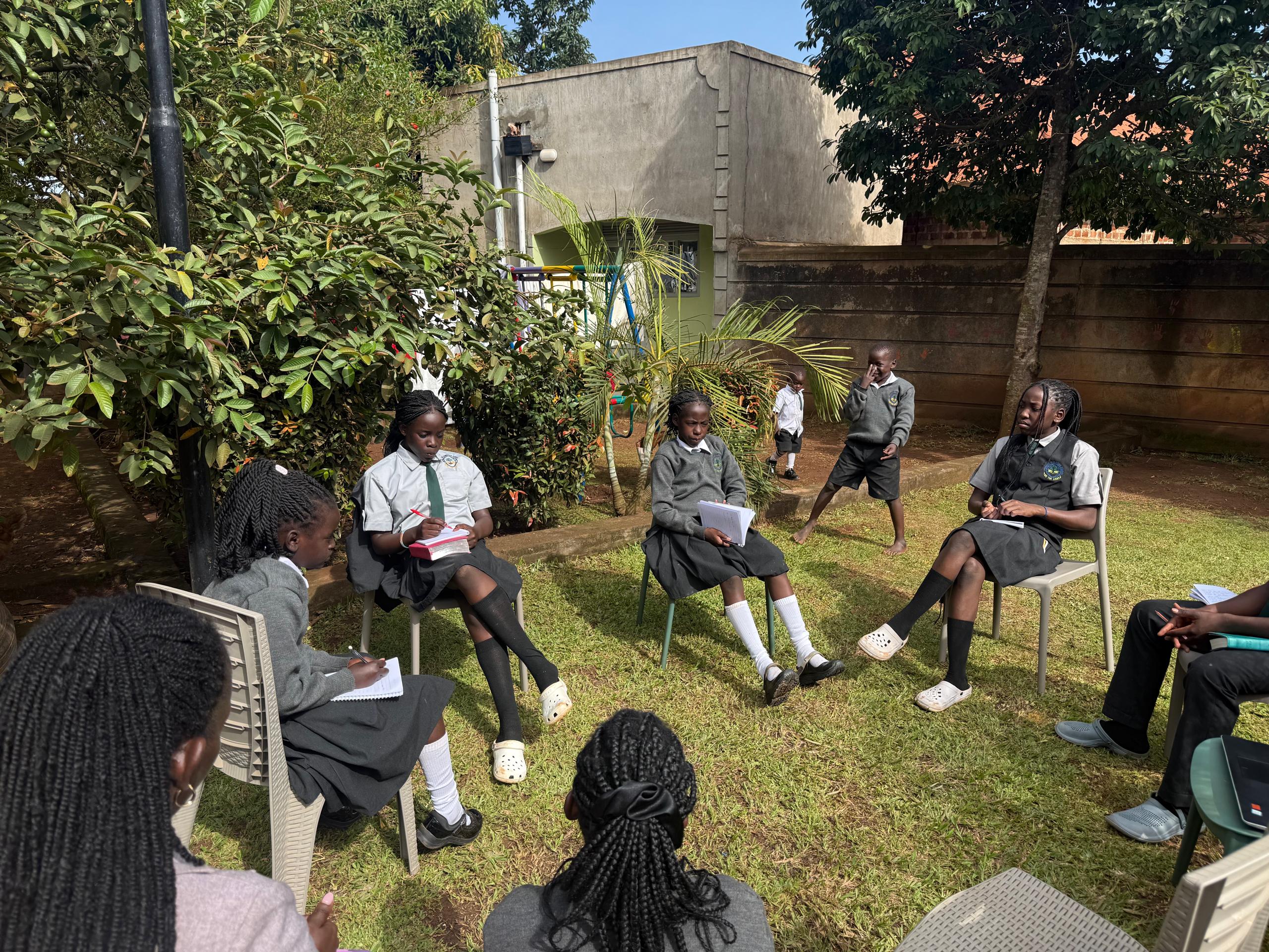 Students learning together outdoors